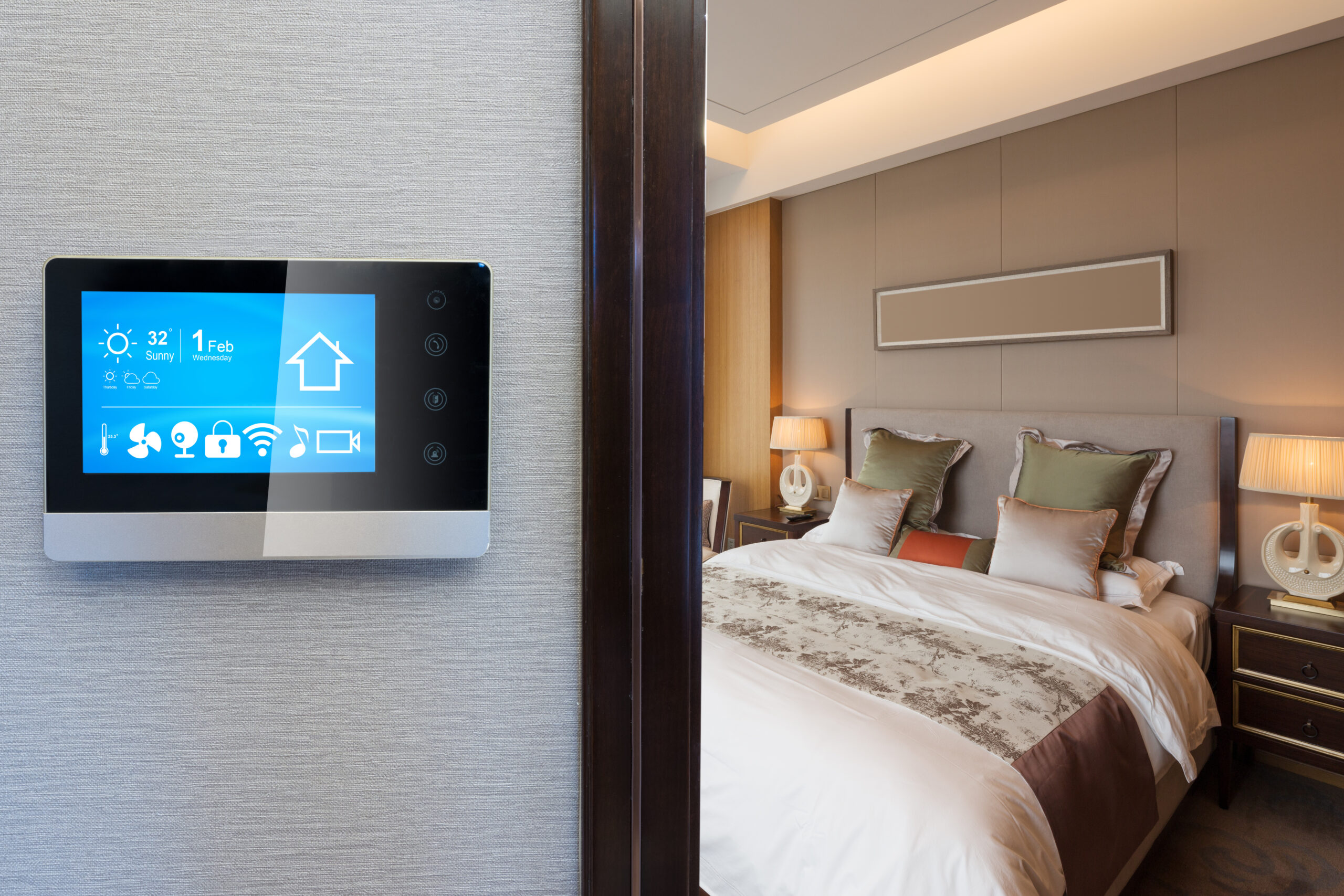 Bedroom with a smart screen attached to the wall